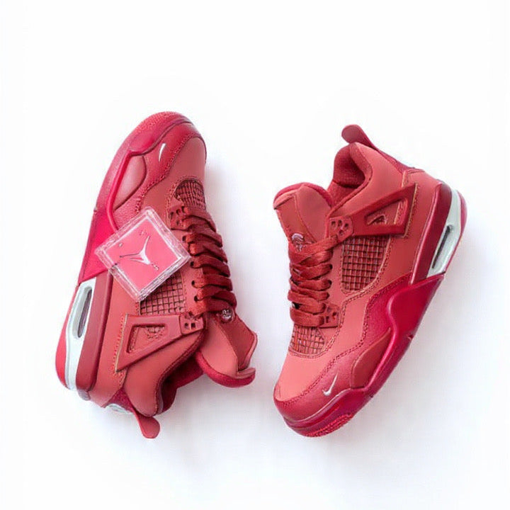 Red high-top sneakers on a white background